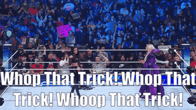 A Woman In A Purple Dress Is Standing In A Wrestling Ring With The Words Whoop That Trick Whoop That Trick GIF