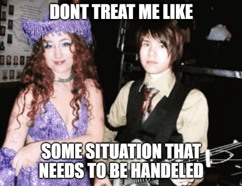 A Woman In A Purple Dress Is Standing Next To A Man In A Suit And Tie GIF