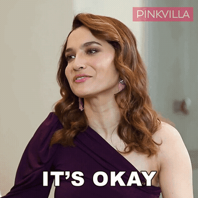 A Woman In A Purple Dress Says It 'S Ok GIF