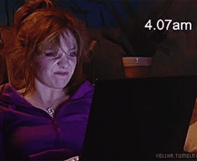 A Woman In A Purple Jacket Is Using A Laptop With The Time 4.08Am GIF