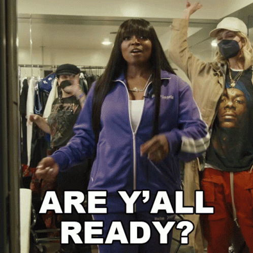 A Woman In A Purple Jacket Says Are Y All Ready GIF
