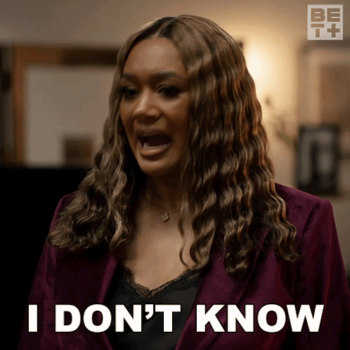 A Woman In A Purple Jacket Says I Don T Know GIF