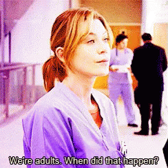 A Woman In A Purple Scrub Top Says " We 'Re Adults When Did That Happen ? " GIF