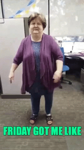 A Woman In A Purple Shirt Is Dancing In An Office With The Words Friday Got Me Like Above Her GIF