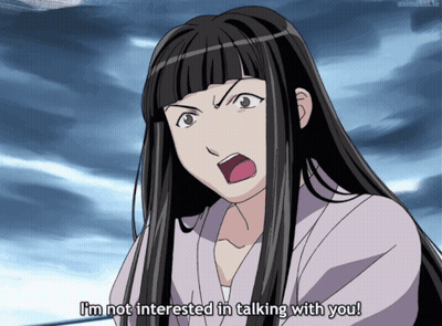 A Woman In A Purple Shirt Says " I 'M Not Interested In Talking With You " GIF