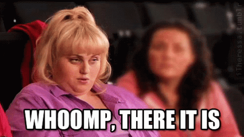 A Woman In A Purple Shirt Says Whoomp There It Is . GIF