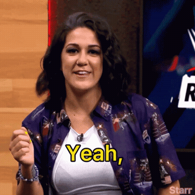 A Woman In A Purple Shirt Says " Yeah " GIF