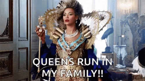 A Woman In A Queen 'S Costume Is Holding A Crown And A Cane And Says Queens Run In My Family GIF