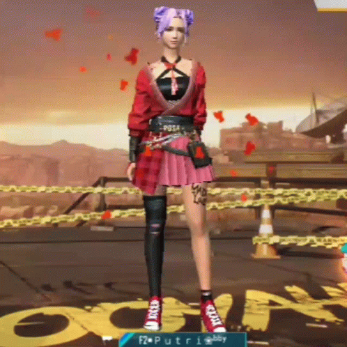 A Woman In A Red And Pink Dress Is Standing In Front Of A Chain Link Fence In A Video Game . GIF
