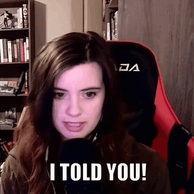 A Woman In A Red Chair Says I Told You In Front Of A Microphone GIF
