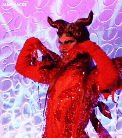 A Woman In A Red Devil Costume Has The Name Janeyjacke At The Bottom GIF