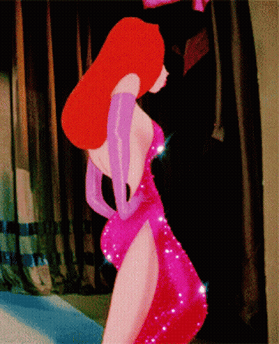 A Woman In A Red Dress And Purple Gloves Is Standing In A Room GIF