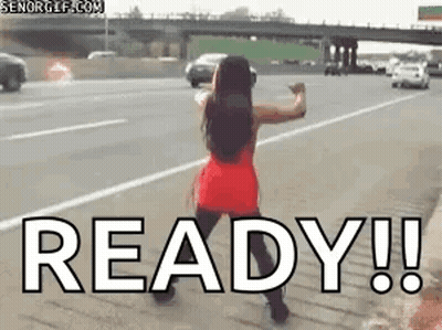 A Woman In A Red Dress Is Dancing On The Side Of A Highway With The Word Ready . GIF