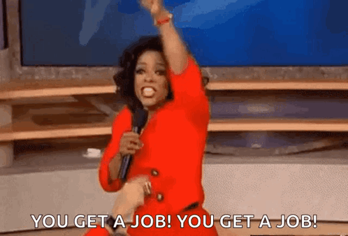 A Woman In A Red Dress Is Holding A Microphone And Saying `` You Get A Job You Get A Job '' . GIF