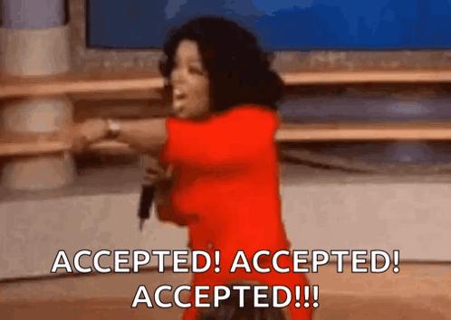 A Woman In A Red Dress Is Holding A Microphone And Says Accepted ! Accepted ! Accepted !! GIF