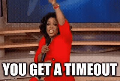 A Woman In A Red Dress Is Holding A Microphone And Screaming . GIF