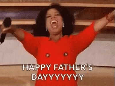 A Woman In A Red Dress Is Holding A Microphone With Her Arms Outstretched And Says Happy Father 'S Day . GIF