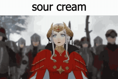 A Woman In A Red Dress Is Standing In Front Of A Group Of Soldiers With The Words Sour Cream Written Above Her GIF