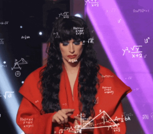 A Woman In A Red Dress Is Standing In Front Of A Purple Wall With Math Equations On It GIF