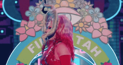 A Woman In A Red Dress Is Standing In Front Of A Sign That Says Fu Tah GIF