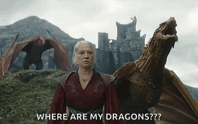 A Woman In A Red Dress Is Standing Next To A Dragon And Asking Where Are My Dragons . GIF