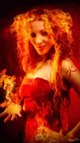 A Woman In A Red Dress Is Surrounded By Flames And Has The Letters Beus777 On Her Arm GIF