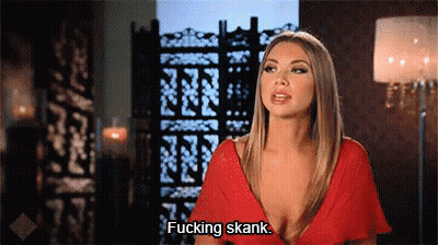 A Woman In A Red Dress Is Talking And Says Fucking Skank . GIF