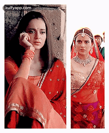 A Woman In A Red Dress Is Talking On A Cell Phone Next To A Woman In A Purple Dress . GIF