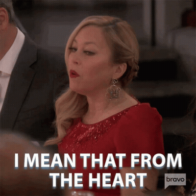 A Woman In A Red Dress Says I Mean That From The Heart On Bravo GIF