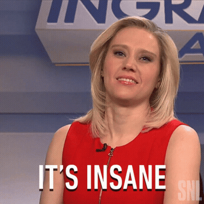 A Woman In A Red Dress Says It 'S Insane On A Sign GIF