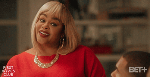 A Woman In A Red Dress Says Sometimes In Front Of A Man GIF
