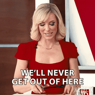 A Woman In A Red Dress Says " We 'Ll Never Get Out Of Here " GIF