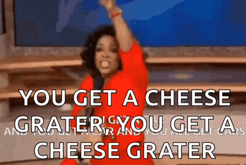 A Woman In A Red Dress Says You Get A Cheese Grater You Get A Cheese Grater And You All Get A Cheese Grater GIF