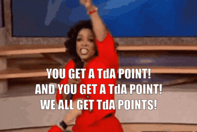 A Woman In A Red Dress Says " You Get A Tda Point " GIF