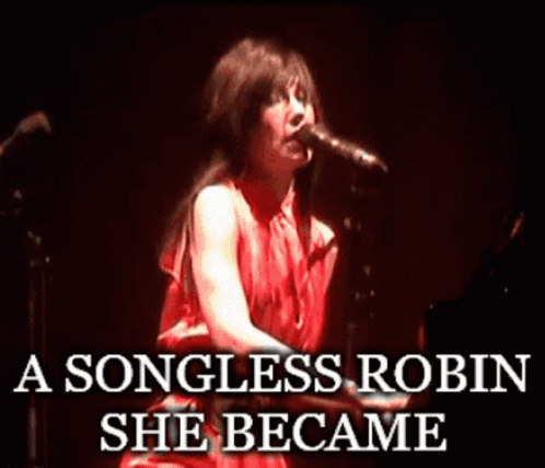 A Woman In A Red Dress Singing Into A Microphone With The Words " A Songless Robin She Became " Below Her GIF
