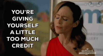 A Woman In A Red Dress With The Words " You 'Re Giving Yourself A Little Too Much Credit " GIF