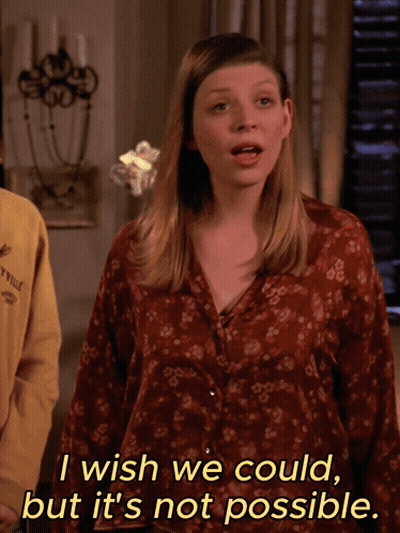 A Woman In A Red Floral Shirt Says I Wish We Could But It 'S Not Possible GIF