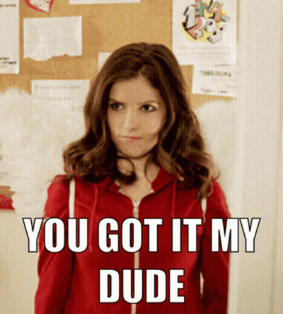 A Woman In A Red Hoodie Is Standing In Front Of A Bulletin Board That Says You Got It My Dude GIF