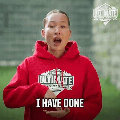A Woman In A Red Hoodie Says I Have Done In Sign Language GIF