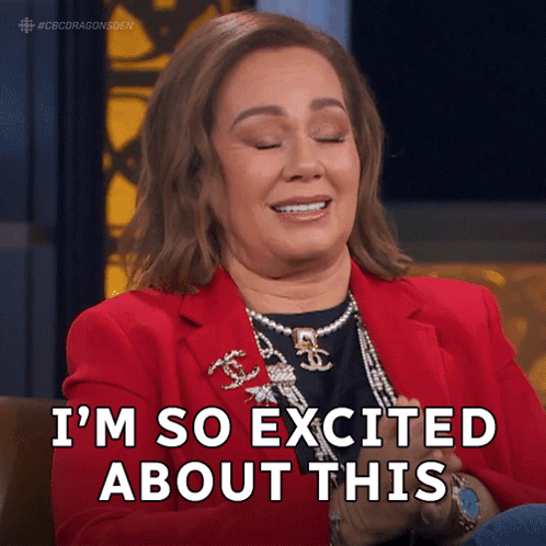 A Woman In A Red Jacket And Pearls Is Saying I 'M So Excited About This GIF