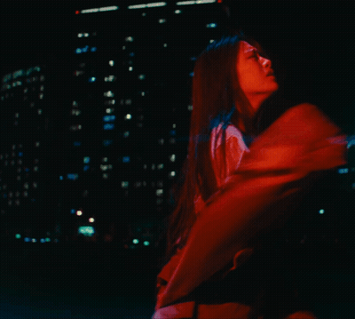 A Woman In A Red Jacket Is Crying GIF