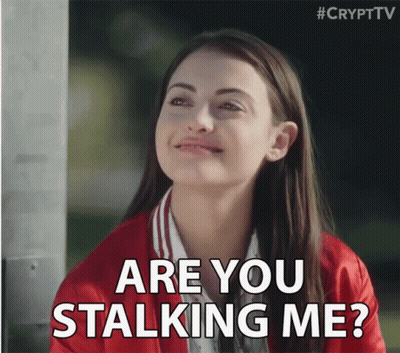 A Woman In A Red Jacket Says " Are You Stalking Me ? " GIF