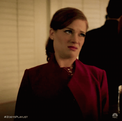 A Woman In A Red Jacket With The Hashtag #Zoeysplaylist On The Bottom GIF