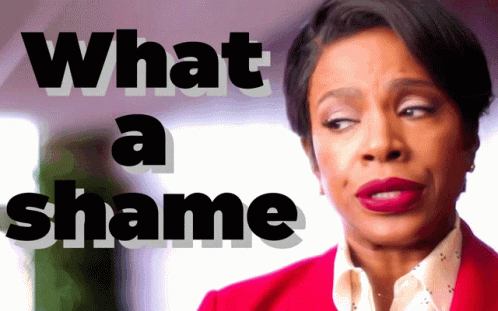 A Woman In A Red Jacket With The Words What A Shame Below Her GIF