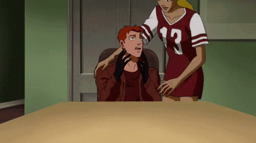 A Woman In A Red Jersey With The Number 13 On It Is Standing Next To A Man Sitting At A Table GIF
