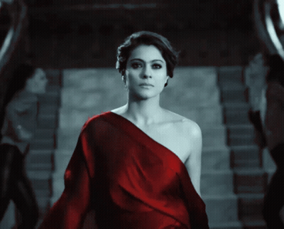 A Woman In A Red Off The Shoulder Dress GIF