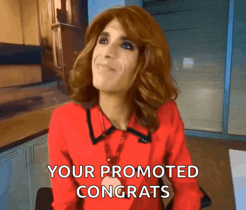 A Woman In A Red Shirt Is Congratulating Someone GIF