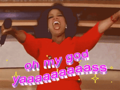 A Woman In A Red Shirt Is Holding A Microphone And Says Oh My God Yaaaaaaa Ass GIF