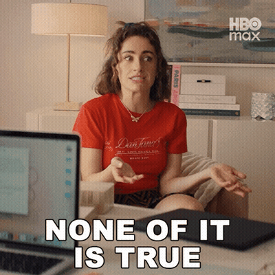 A Woman In A Red Shirt Is Sitting In Front Of A Laptop Computer And Says None Of It Is True GIF