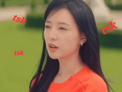 A Woman In A Red Shirt Is Surrounded By Red Tsk Letters GIF